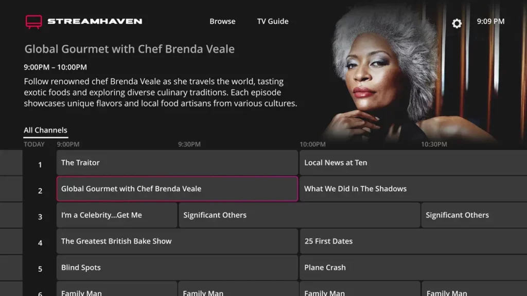 Television screen showing a travel cooking program "Global Gourmet with Chef Brenda Veale" on the New Freely Channel at 8:30pm. Next programs listed are news, a comedy show, and a documentary.